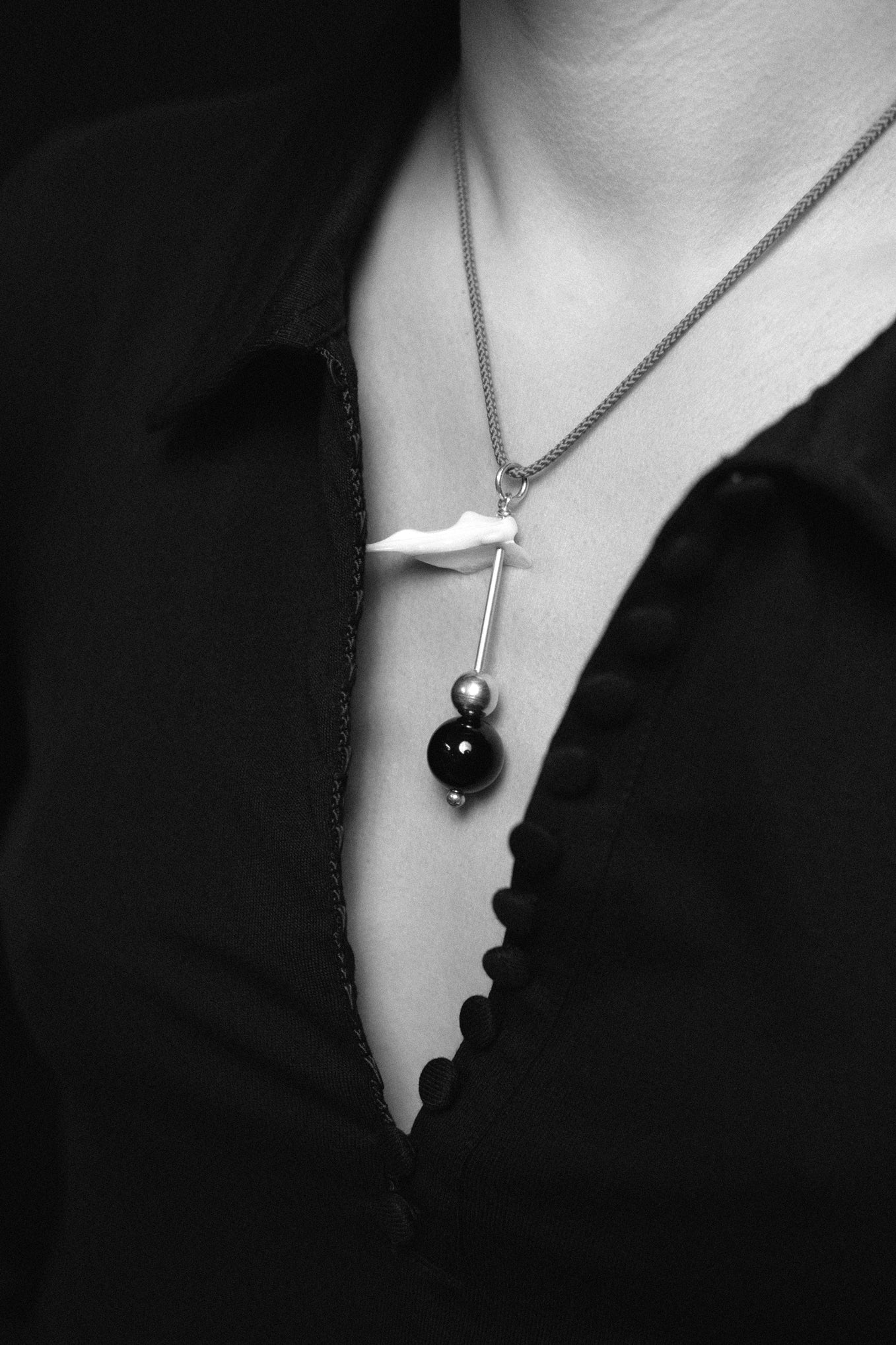 JAPAN EDIT — FISH BONE MOTHER OF PEARL & ONYX TOTEM PENDANT .06