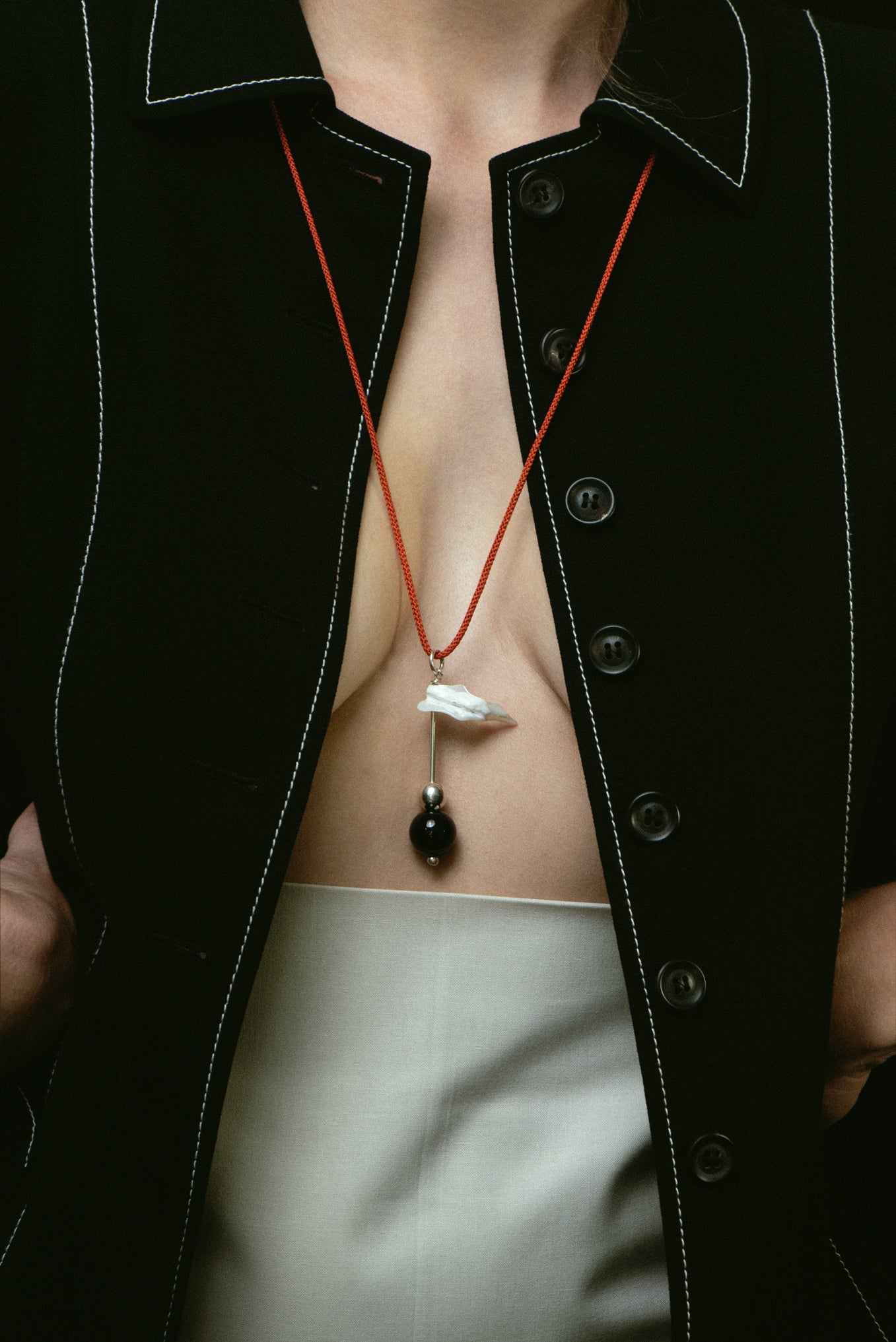FISH BONE MOTHER OF PEARL & ONYX TOTEM PENDANT .06