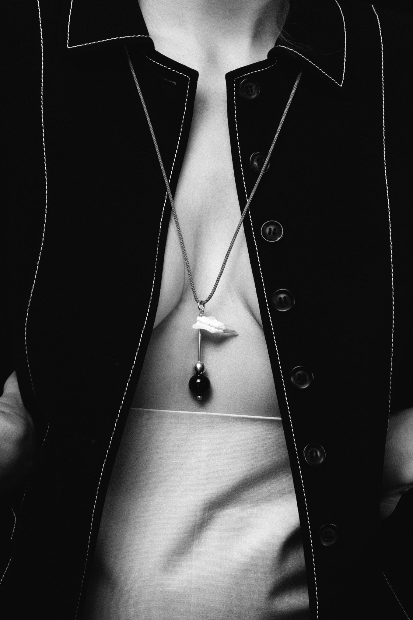 JAPAN EDIT — FISH BONE MOTHER OF PEARL & ONYX TOTEM PENDANT .06