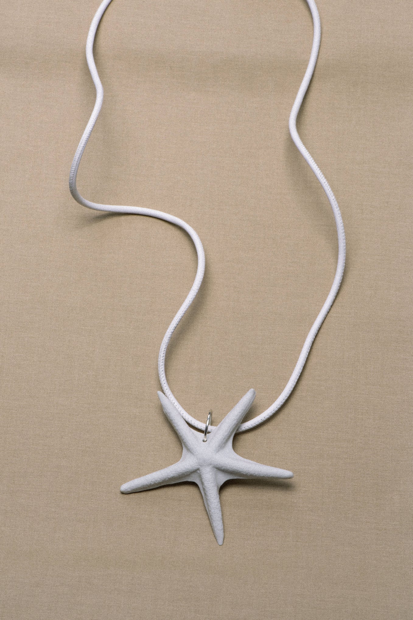 STAR AMULET .01 PENDANT - LEATHER
