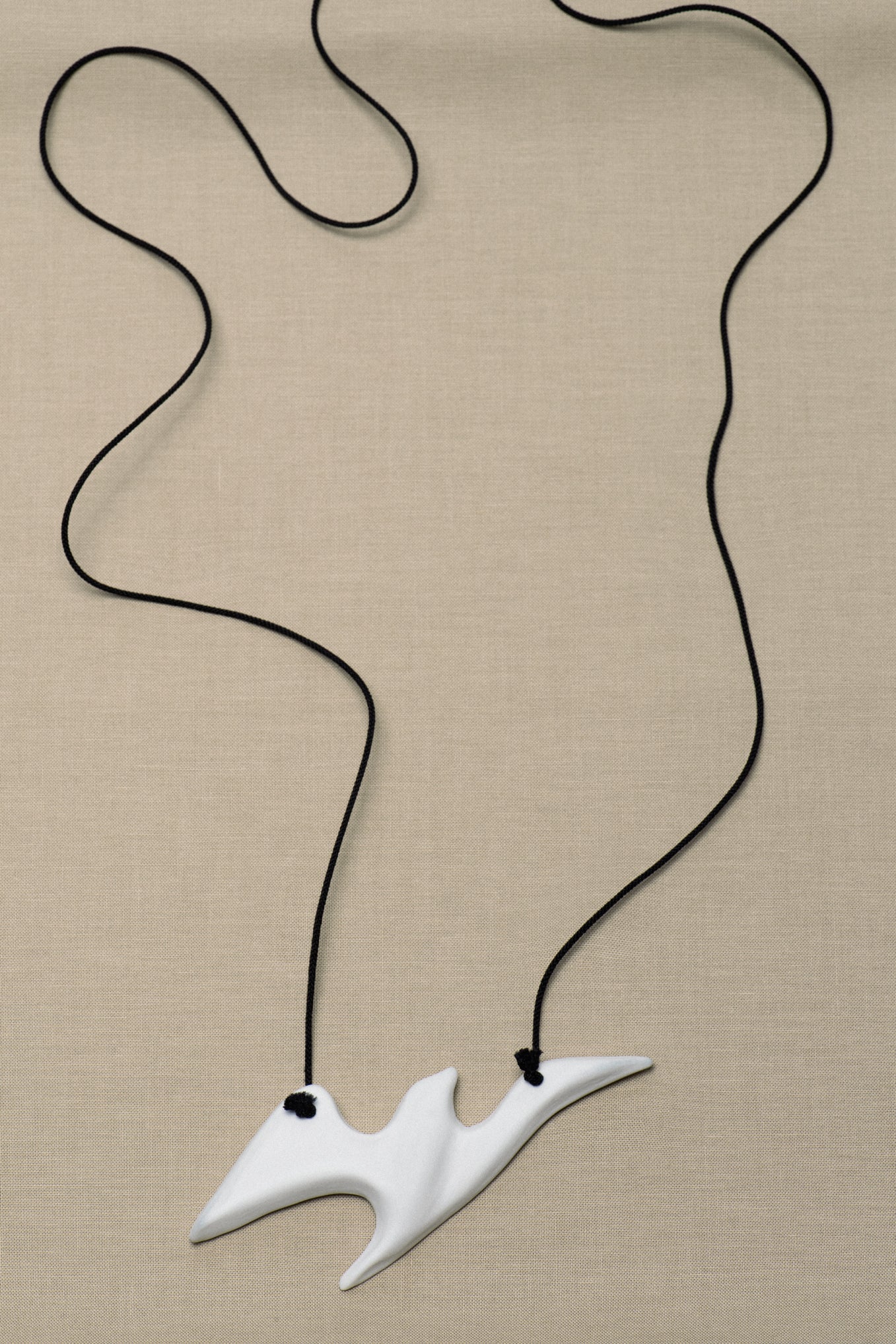 GIACOMETTI'S BIRD AMULET .01 SILK NECKLACE