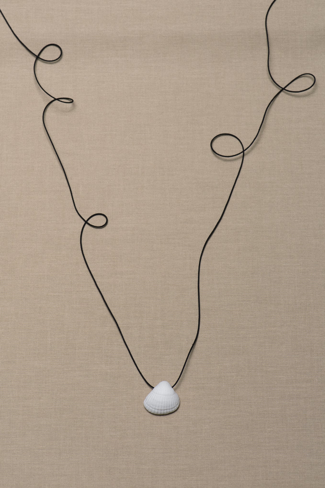 SHELL AMULET .012 NECKLACE