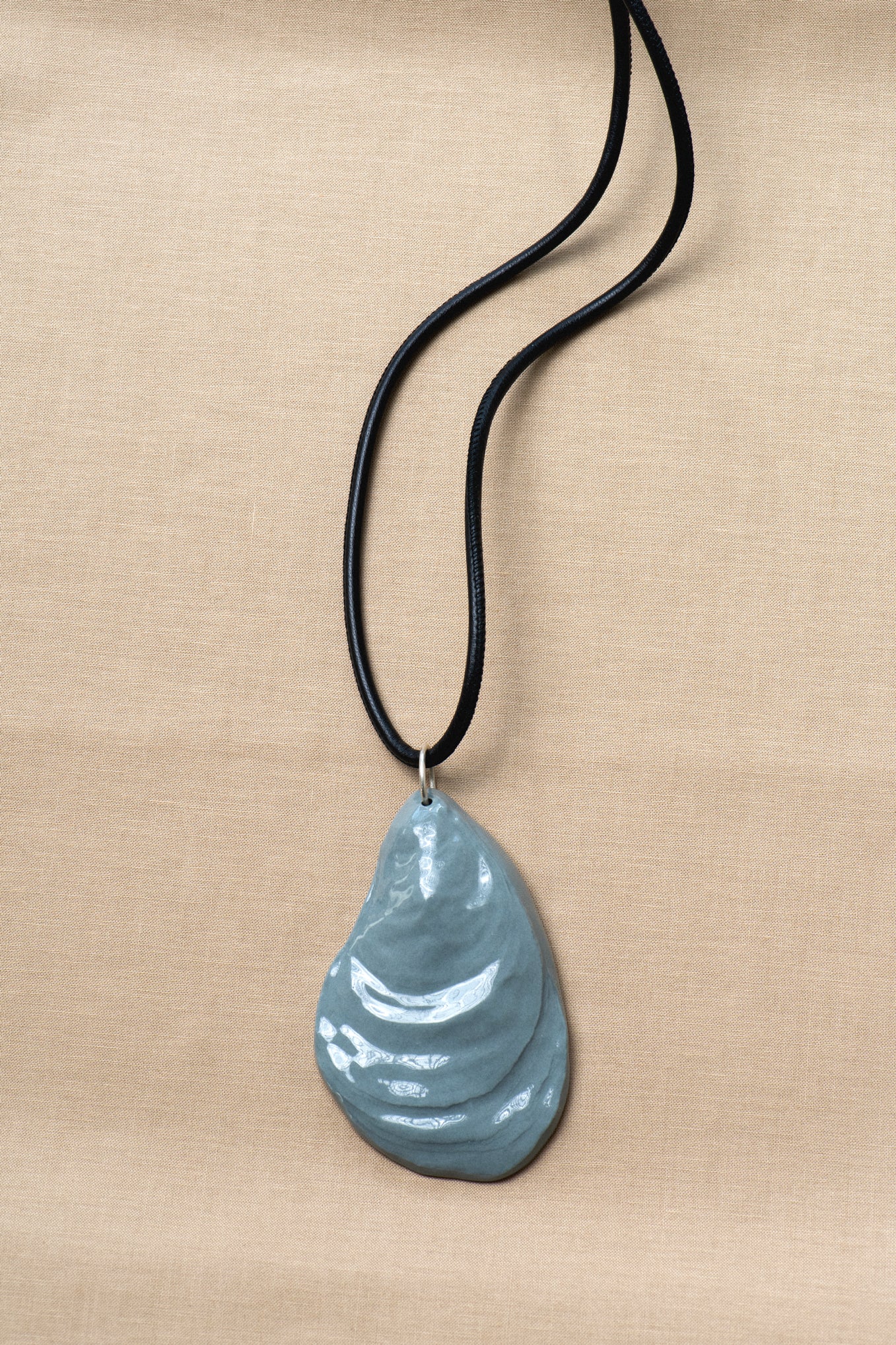 OYSTER SHELL AMULET .05 LEATHER PENDANT - SEA FOAM BLUE