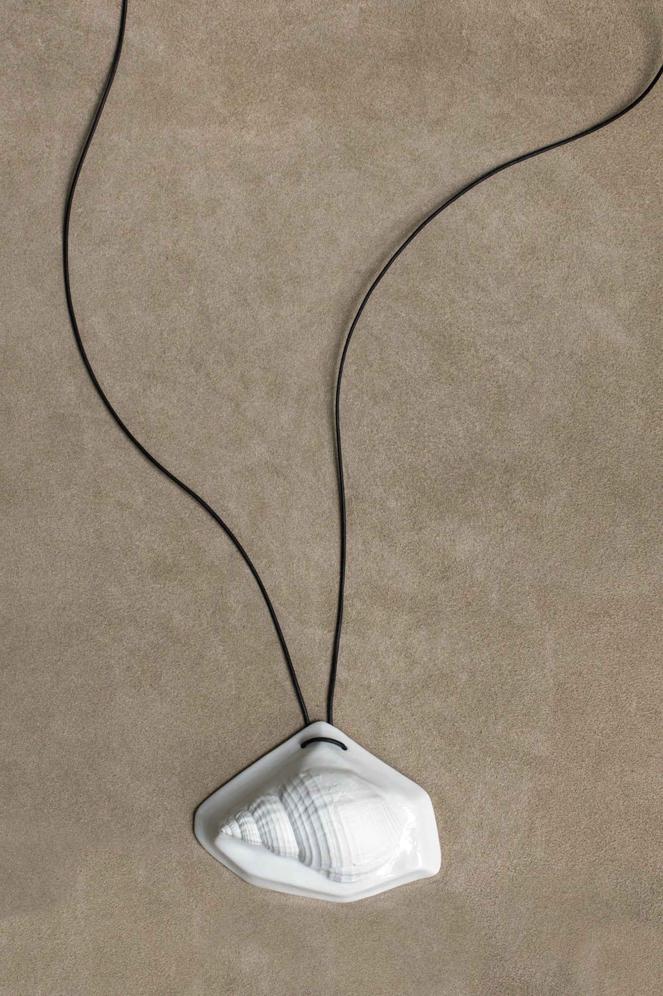 SHELL AMULET. 09 PENDANT