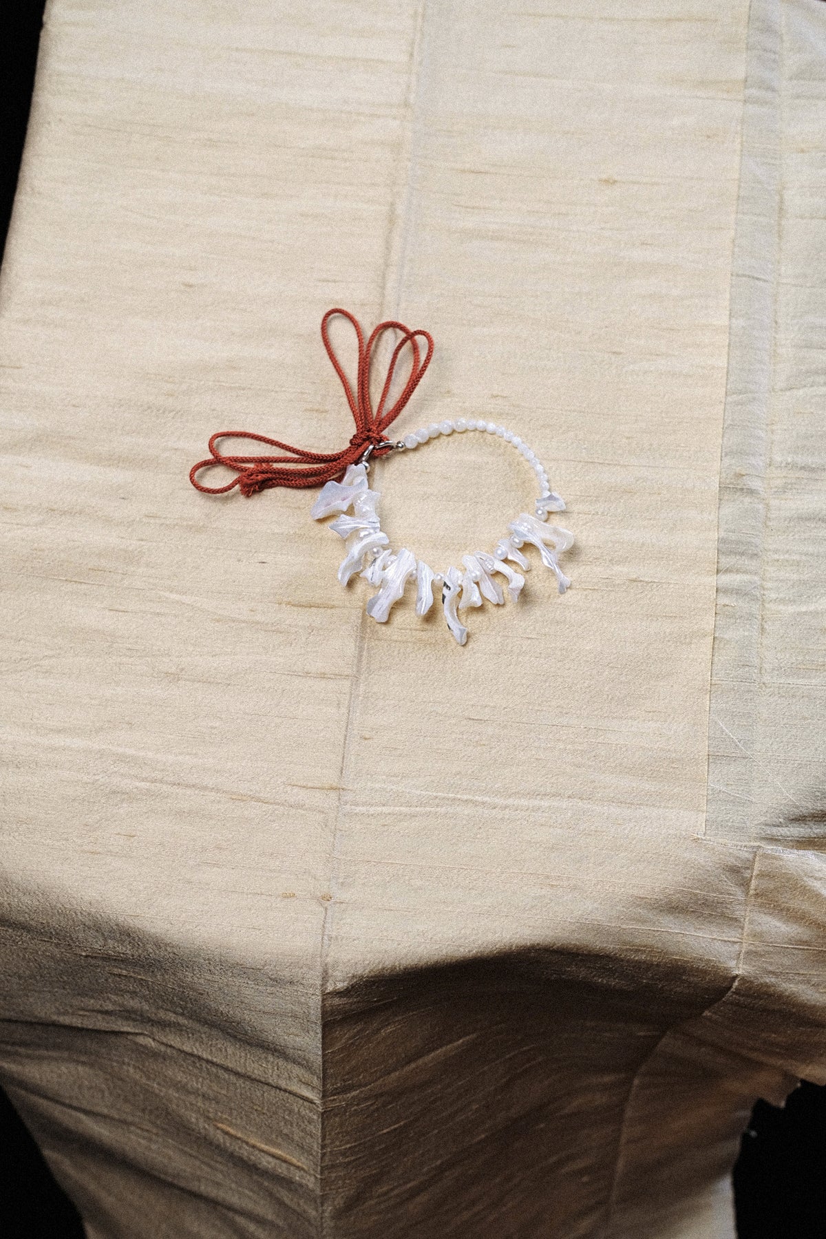 FISH BONE MOTHER OF PEARL SILK ANKLET - BLACK