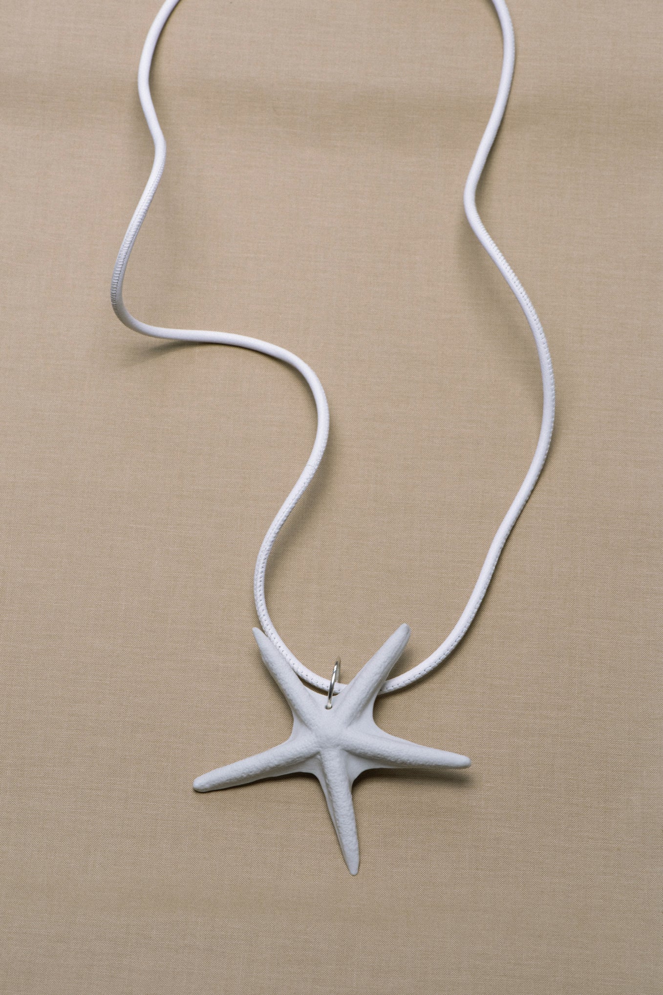 SEA STAR AMULET .01 PENDANT - WHITE